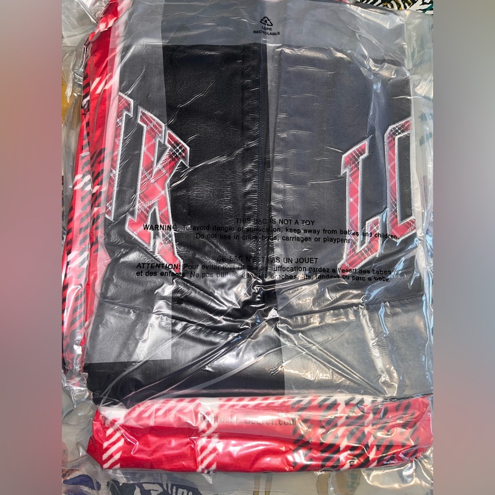 Brand new (in vacuum sealed bag) Victoria secret blanket & matching tote.